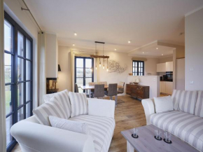 Reetland am Meer - Premium Reetdachvilla mit 3 Schlafzimmern, Sauna und Kamin F04, Dranske